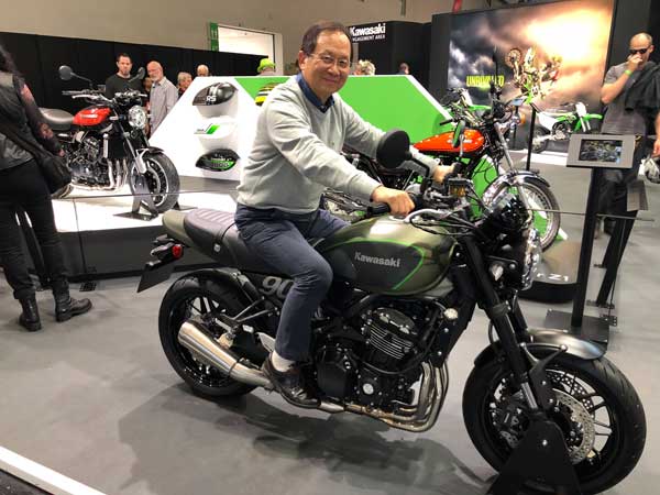 David Kho Revv Bike founder at intermot 2018 sitting on a new Kawasaki model